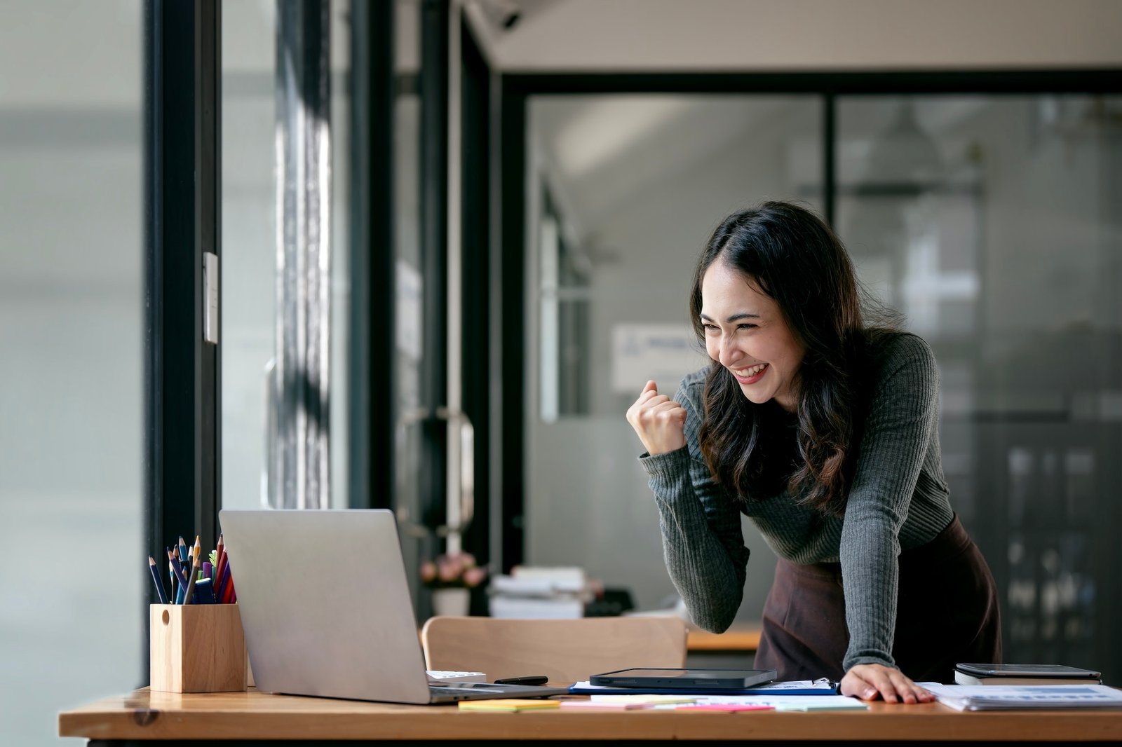 beautiful asian woman celebrate with laptop successful business startup small business concept